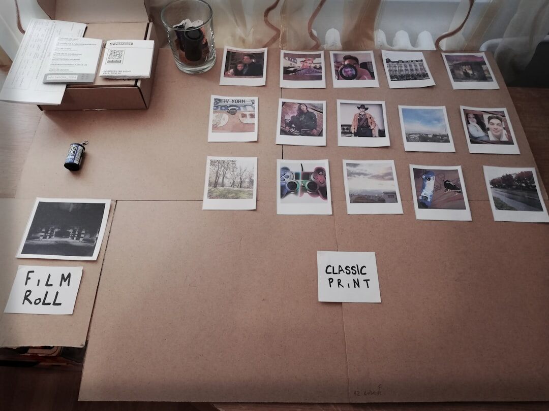 Rows of contact-sheet style documentary photographs on a light table