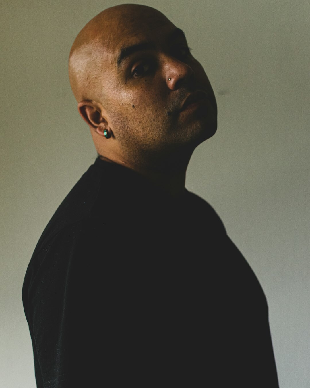 Studio portrait of a Chilean male documentary photographer